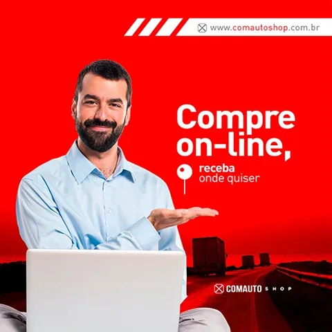 Comauto Shop “Compre on-line, receba onde quiser” post: smiling man with a laptop