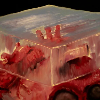 Detail of 'Suffering': a hand pressed against the top glass block