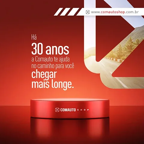 Comauto Shop 30th anniversary post: red podium with a road in the background