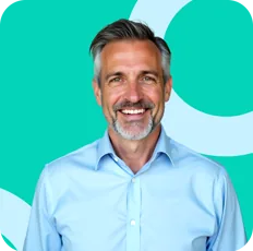 Persona portrait: smiling gray-haired man on teal