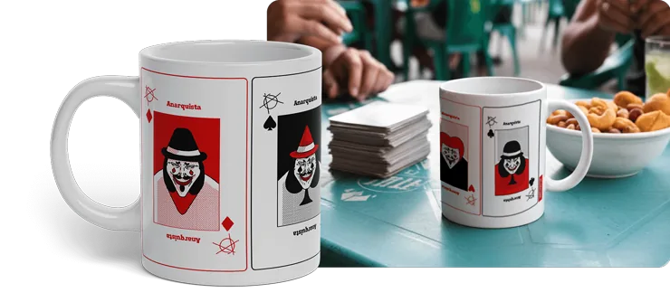 Baralho Anarquista! mug with masked-anarchist playing cards, on a bar table with snacks
