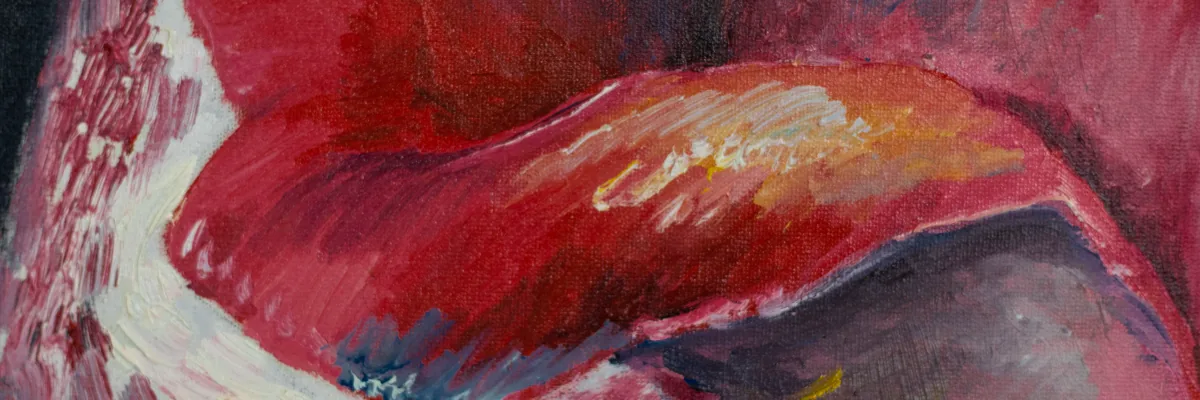 Close-up of thick red brushstrokes on a painted heart
